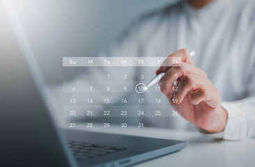 time management concepts. calendar on a virtual screen. businessmen manage time for effective work. 
