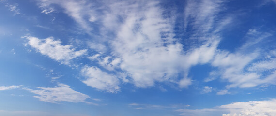 Wall Mural - beautiful sunny day background. blue sky and white clouds