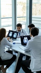 Aufkleber - Doctors and healthcare professionals gather around a table, examining and discussing a brain scan on a laptop, engaging in a collaborative medical consultation