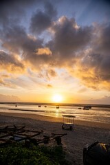 Wall Mural - beach sunset with vibrant clouds