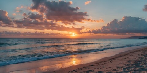 Canvas Print - Sunset over calm ocean waves with colorful clouds reflecting in the water and sandy beach in the foreground, Copy Space