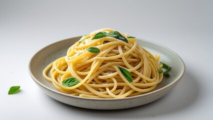 Aufkleber - Spaghetti pasta with fresh herbs served in a rustic bowl on a plain background with copy space for text.