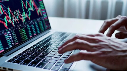 Poster - Financial professional analyzing market trends, typing on laptop keyboard with candlestick charts, showcasing investment strategy in dynamic slow motion workplace environment