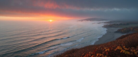 Poster - Sunrise over misty ocean waves with colorful sky and foamy shoreline in coastal landscape with autumn foliage foreground Copy Space