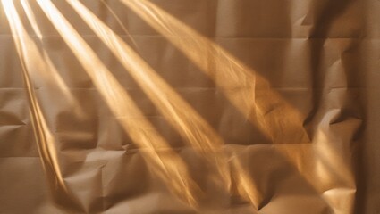 Poster - Wrinkled textile surface illuminated by sunlight with diagonal light rays visible in modern photography style Copy Space