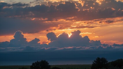 Aufkleber - Dramatic sunset with colorful clouds and sun peeking through, silhouette of trees in foreground, serene sky landscape, Copy Space