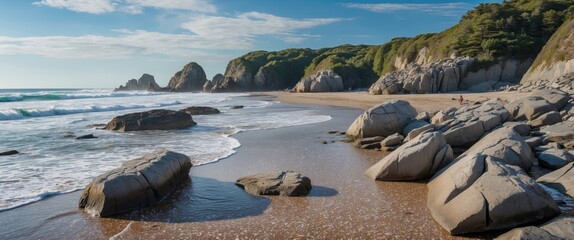 Wall Mural - Scenic beach landscape with rocky shoreline and gentle waves under a clear sky in daylight Copy Space