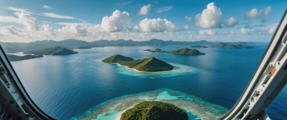 Poster - Aerial view of tropical islands with lush greenery and turquoise waters under a partly cloudy sky, seen from an aircraft window. Copy Space