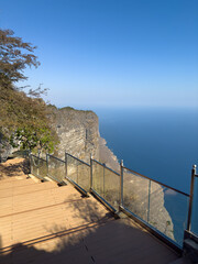 jabal shaat viewpoint platform overlooking dramatic cliffs in southern oman, salalah