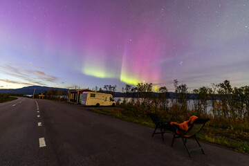motorhome and northern lights in kiruna, sweden.