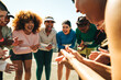 © Jacob Lund - Group of diverse runners cheering and supporting each other