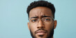 © Lila Patel - Close-up Portrait: Young Black Man Wearing Glasses
