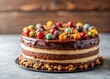 © prapatsorn - Minimalist Delicious Three-Layered Chocolate Cake with Nuts & Candy