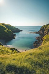 Sticker - Serene cove with turquoise water, sandy beach, and green hills under a sunny sky.