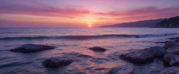 Aufkleber - Colorful sunset over calm ocean waters with rocky shoreline and soft clouds in the sky Copy Space