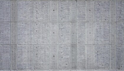 Wall Mural - gray concrete wall with textured blocks and visible bolts, ideal for industrial and architectural design background