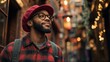 © InspirationDesign - Cheerful African American man in casual winter wear against festive lights. Ideal for urban lifestyle, seasonal fashion, and authentic happiness