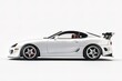© Nurjuanda - White Sports Car Side View