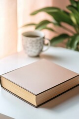 Poster - Open book on a table next to a cup of coffee