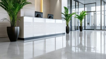 Poster - A large lobby with a white desk and two black computer monitors