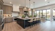 © RaksaLinggo - Spacious kitchen showcases island seating and backyard access seamlessly