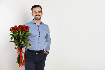 Sticker - Happy Valentine's Day. Handsome man with bouquet of roses on white background. Space for text