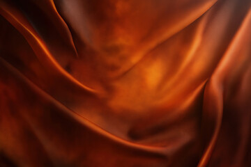 Poster - Warm fabric draped elegantly in deep orange and brown shades creates a rich texture