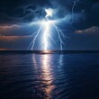 © NANNIE  TWITTY - lightning over the sea