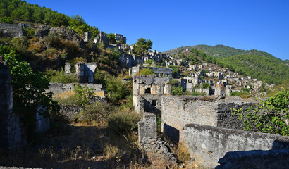 Sticker - Historical Kayakoy, located in Fethiye, Turkey, is an old Greek settlement with abandoned houses and churches.