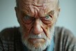 © Shweta - Portrait of an old angry man, white background