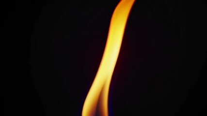Poster - Single flame against black background, abstract light concept