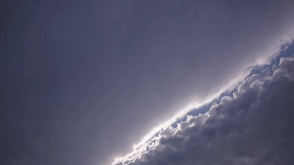 Poster - Dramatic cloudy sky with silver lining, contrast of light and shadow. Nature and weather concept