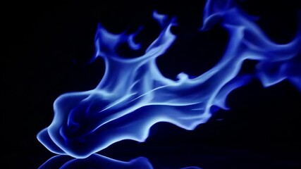 Poster - Blue flame against black background, abstract fire art concept