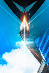 Poster - Modern architectural concept in Hong Kong business district, featuring futuristic skyscraper reaching for the sky with dynamic perspective and vibrant blue tones.