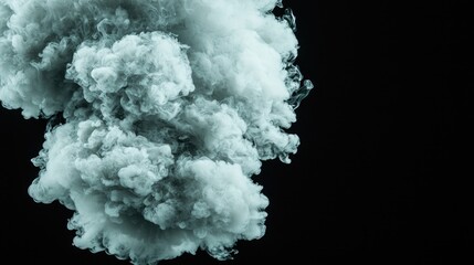 Abstract teal smoke cloud on black background. Possible use Stock photo for abstract art, science, or design projects