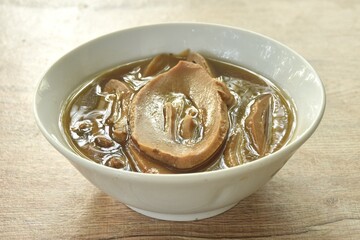 Wall Mural - boiled braised slice Chinese bamboo shoot in Chinese herb soup vegetarian food in bowl