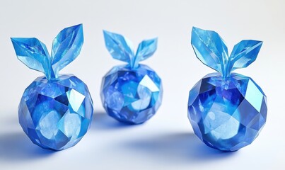 Wall Mural - Three sparkling blue crystal apples with translucent leaves against a light background, ideal for decorative purposes