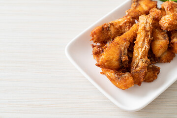 Wall Mural - Fried Snapper Belly on white plate