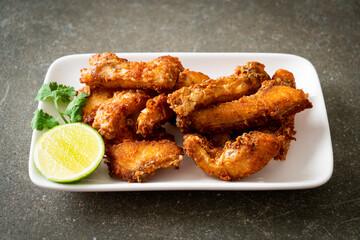 Wall Mural - Fried Snapper Belly on white plate