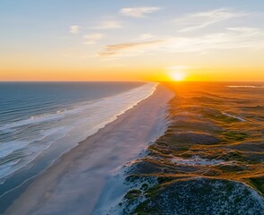 Canvas Print - Coastal dune aerial view at sunrise with ocean waves, sky, and horizon; for travel or nature theme