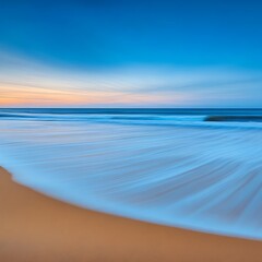 Wall Mural - Seascape motion blur on beach with sunrise backdrop for background or nature photography