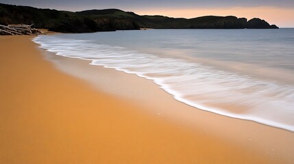 Canvas Print - Wave washing ashore on sandy beach with cliffs in background, tranquil scene for meditation image