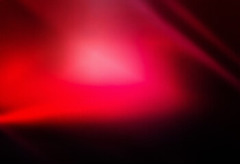 Grainy red gradient texture background with dark shades. Abstract image with light and shadow play creating a textured surface.