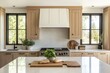 © Jam - Bright kitchen showcases an island with baked bread and fresh herbs, surrounded by stylish cabinetry and large windows bringing in natural light