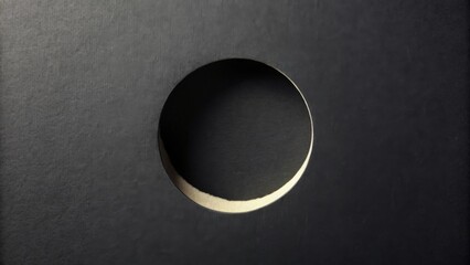 Aufkleber - Abstract circular cutout in dark textured surface, suggesting a mysterious void or hidden space, ideal for design concepts, minimalist aesthetics, or adding depth to a composition.