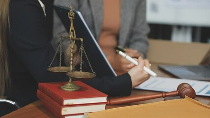 Wall Mural - Judge or Legal advisor lawyer examining and signing legal documents.