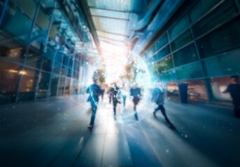 Poster - A blurry view of people walking through a modern glass building.