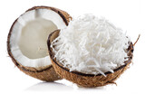 Grated coconut pulp in cracked coconut shell and half of split coconut on white background. File contains clipping path.
