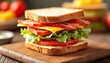 © KarpenArt Studio - A sandwich with tomatoes, lettuce, cheese, and bacon on whole wheat bread.