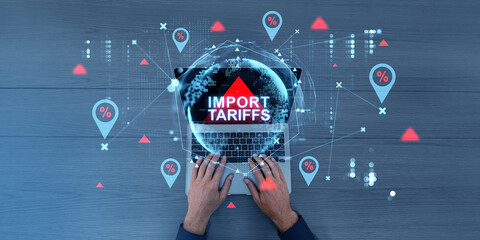 Poster - Import tariffs increase concept with digital graphics and laptop.
